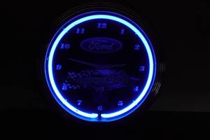 lot 260 image: Powered By Ford Chromed Neon Clock