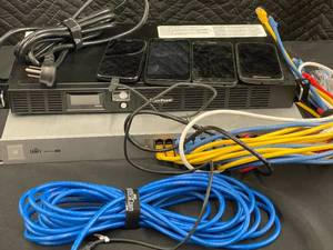 lot 8 image: J2 - UniFi Switch 24 250W Power Supply with CyberPower OR500LCDRM1U and Miscellaneous Smartphones
