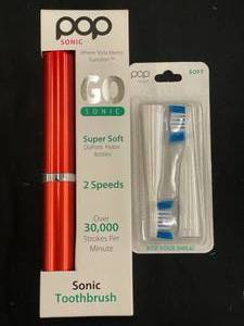 lot 50 image: Pop Sonic GoSonic Toothbrush with Replacement Brush Heads