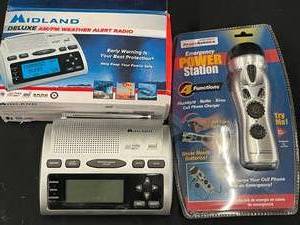 lot 94 image: GA5 - Midland Deluxe AMFM Weather Alert Radio and Ready America Emergency Power Station