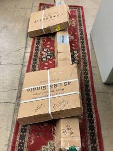 lot 157 image: Everyday Essentials Weight Bar with 2 Black Bumper Plates (45 lbs Each)