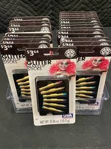lot 247 image: GA2 - Lot of 24 Packs of Rubies Glitter Makeup Sticks