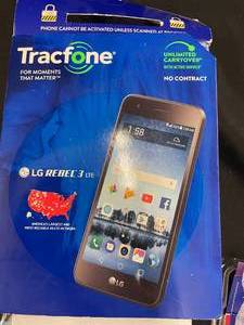 lot 254 image: GA5 - Tracfone LG Rebel 3 LTE Smartphone with Accessories