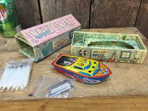 lot 13 image: Tin Candle Power Boat