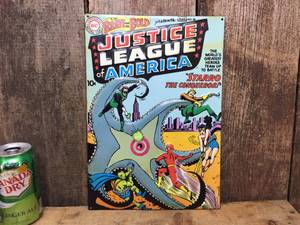 lot 17 image: Justice League of America Embossed Metal Sign