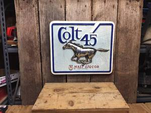 lot 80 image: Vintage Colt 45 Sign