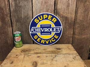 lot 85 image: Ande Rooney Porcelain Chevrolet Round Metal Sign