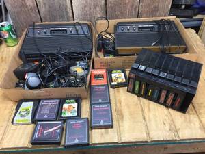 lot 128 image: 2 Vintage Atari 2600 Game Consoles - Games - Accessories