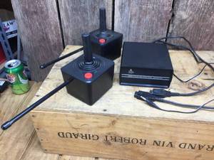lot 129 image: Vintage Atari 2600 Remote Control Joystick Set