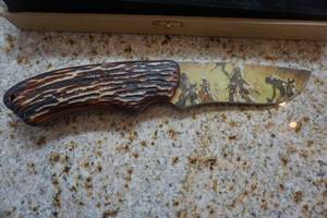 lot 33 image: Wild Outdoors Native Themed Fixed Blade Knife With Wood Storage Box