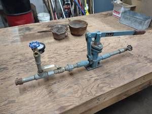 lot 119 image: Griswold Test Pump...