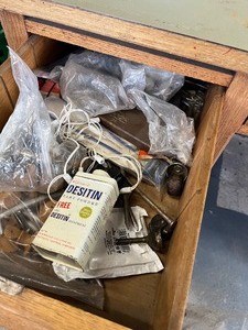 Desk loaded with misc items