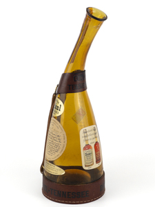 lot 103 image: VINTAGE 1964 George Dickel Tennessee Commemorative  Souvenir 14 gal Whiskey Bottle with Leather Harness 