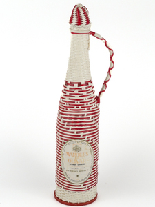 lot 121 image: Vintage Plastic  Marques De Olivar  Spanish Chablis - Vintage 1964.  Red Wicker Wrapped Wine Bottle