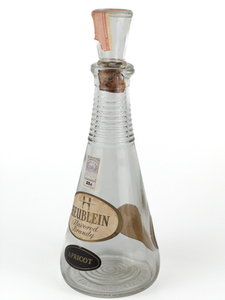 lot 123 image: VINTAGE Heublein Apricot Flavored Brandy Cruet Bottle. Circa 1955-57