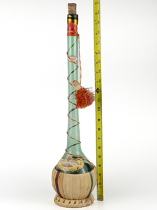lot 138 image: VINTAGE - TALL 20 LONG NECK CHIANTI WINE BOTTLE VINTAGE 1959 WICKER WRAP