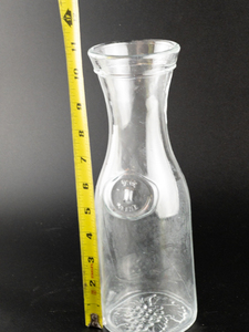 lot 176 image: Vintage LIBBEY OF CANADA - 1 Liter Wine Carafe with Molded Disk and Grape design base