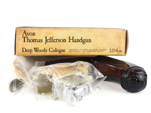lot 202 image: Vintage Avon Thomas Jefferson Handgun Decanter Everest Cologne Full with Original Packaging - UNUSED