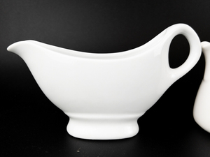 lot 285 image: Group of 6  White Ceramic CreamersCruet