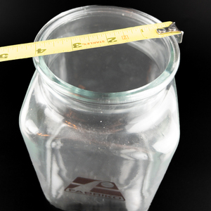 lot 323 image: Anchor Glass Large Square Glass Apothecary Jar with Fabriko Logo on the side.