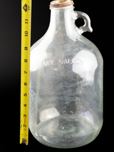 lot 324 image: VINTAGE One Gallon Jug - Field Weathered with Iridescence