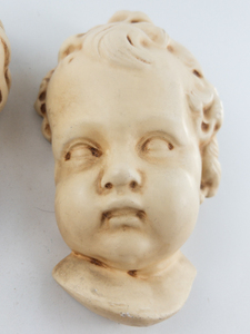 lot 241 image: Vintage Set of 2 -  Chalkware Cherub Putti Angel Baby Face Plaster Wall Plaque