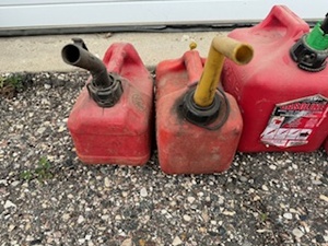 lot 51 image: Seven Two Gallon and Under Gas Cans