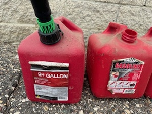 lot 14 image: Four Two-Gallon Gas Cans
