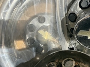 lot 68 image: 99 Chevy Beauty Rings and Lug Covers