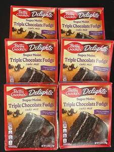 lot 11 image: Lot of 6 Betty Crocker Delights Triple Chocolate Fudge Cake Mix
