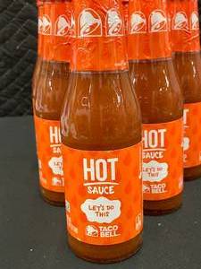 lot 66 image: Taco Bell Hot Sauce Bottles Lot (6-Pack)