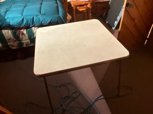 lot 18 image: square folding table with padded top