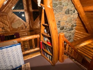 lot 38 image: decorative canoe shelving  contents