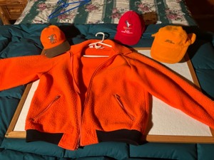lot 58 image: L.L.Bean orange jacket, LLBEAN floppy orange hate, 2caps