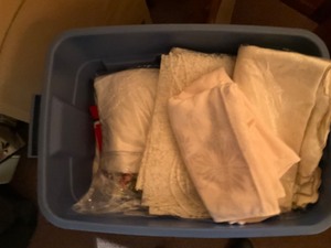 lot 60 image: Tub of table clothes residential
