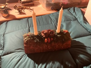 lot 79 image: decorative log candle holder