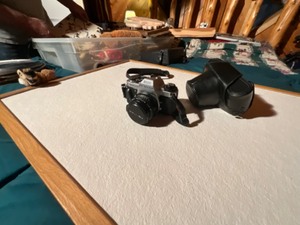 lot 87 image: Pentax camera with case