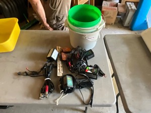 lot 414 image: 4 batt maintainers 12v plus contents