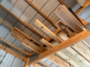 lot 527 image: wood and contents in rafters