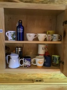 lot 102 image: Contents of Cupboard