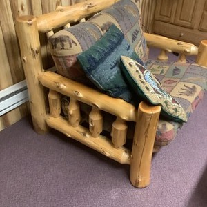 lot 4 image: Up north oversized log chair