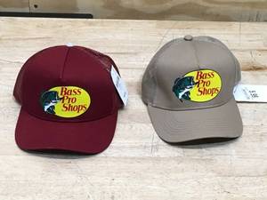 lot 49 image: Lot of 2 - Bass Pro Shops Baseball Caps (One of them has a busted back strap)
