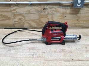 lot 9 image: Used Milwaukee M18 Cordless 2-Speed Grease Gun Model # 2646-20 (Tested And Works) (Tool Only)