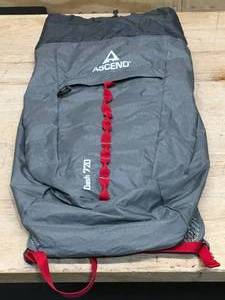 lot 57 image: Ascend Dash 720 Lightweight Backpack (Tear On The Top)