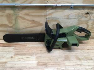 lot 5 image: Green Machine 62V Brushless 16 in. Battery Powered Chainsaw Auto-tensioning system 2.5Ah battery and charger