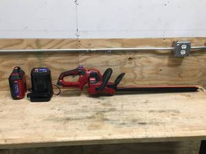 lot 124 image: Toro 60V MAX 24 in. (60.96 cm) Hedge Trimmer With 2Ah Battery And Charger Model # 51840