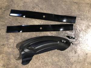 lot 38 image: Cub Cadet Original Equipment 46 in. Mulching Kit with Blades for Lawn Tractors and Zero Turn Mowers Customer Returns See Pictures
