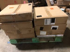 lot 41 image: 7 Boxes of Norsk Multi-Purpose 18.3 in. x 18.3 in. Dove Gray Commercial PVC Garage Flooring Tile with Vented Drain Pattern (6-Pieces)  Customer Returns See Pictures