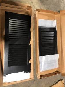 lot 44 image: Lot of 2 Ekena Millwork Americraft 18 in. W x 48 in. H 2-Equal Louver Exterior Real Wood Shutters Pair in Black  Customer Returns See Pictures