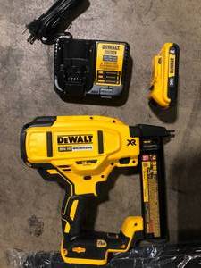 lot 50 image: DEWALT 20V MAX XR Lithium-Ion Cordless 18-Gauge Narrow Crown Stapler Kit with 2.0Ah Battery, Charger and Contractor Bag    Customer Returns See Pictures